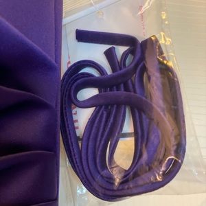 Fit and Flare cocktail. Black embellished bow